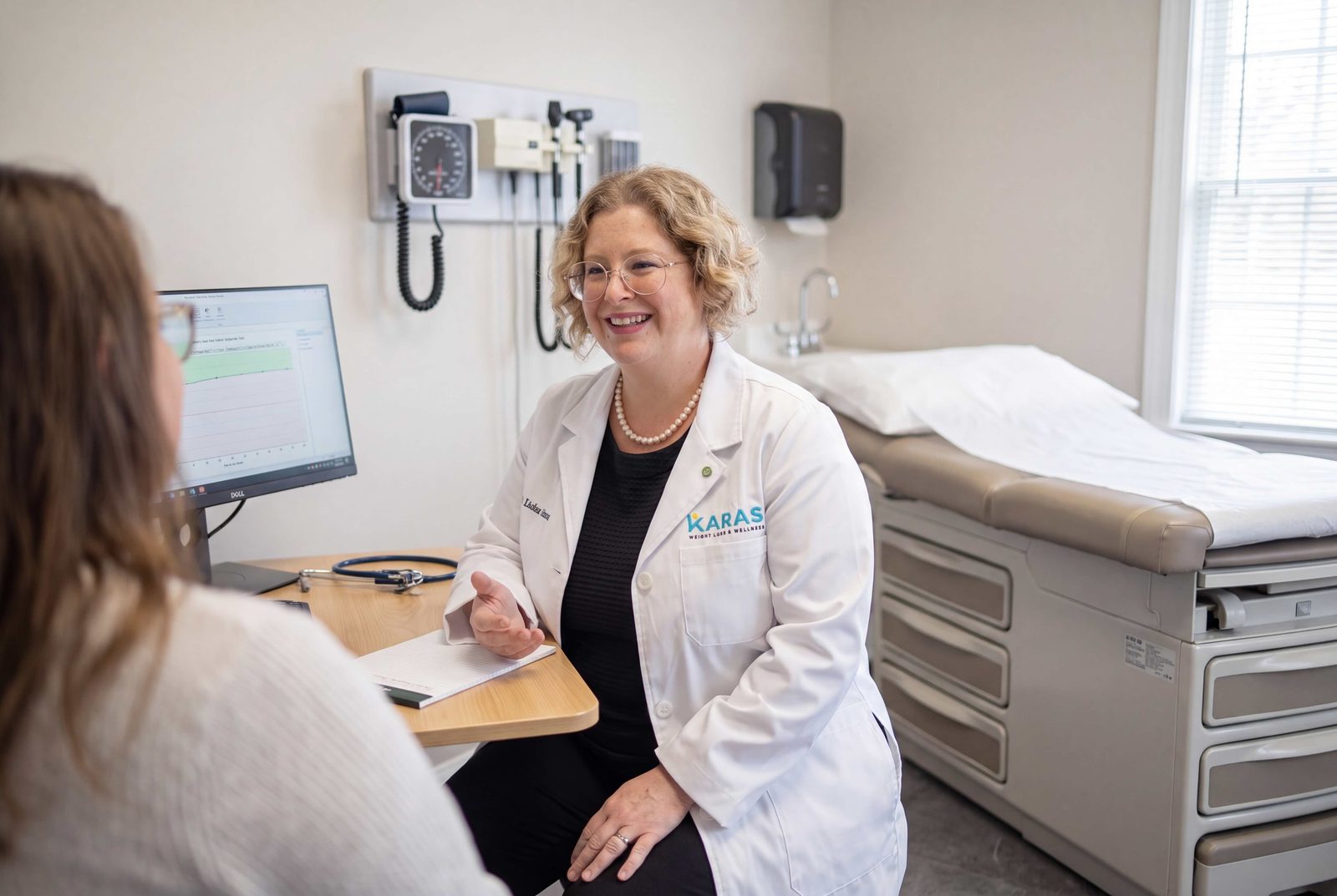 Dr. Linden Karas with a patient at Kara's Weight Loss & Wellness